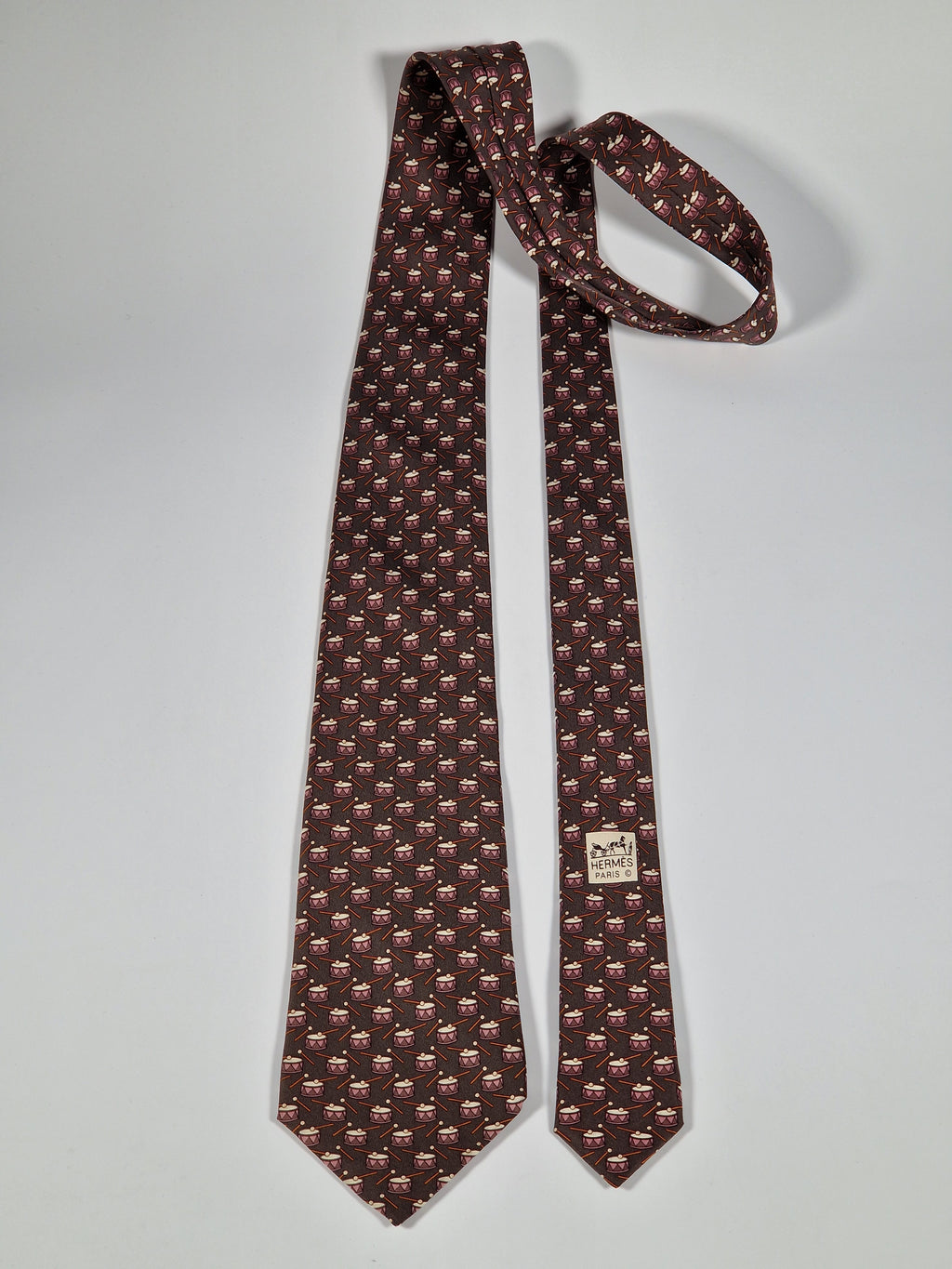Hermès silk tie brown with drums 5345 TA