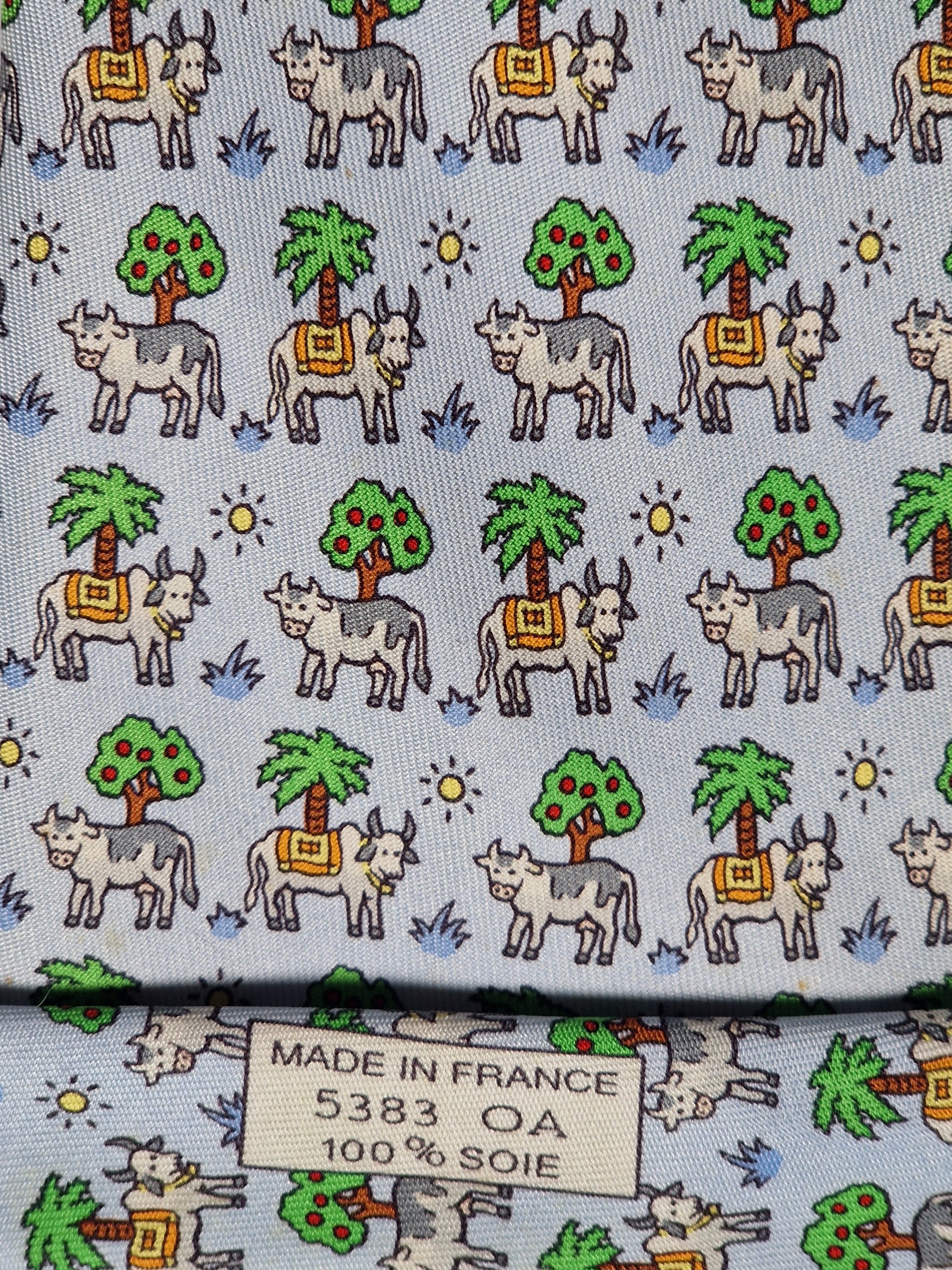 Hermès silk tie blue whimsical cow pattern 5383 OA