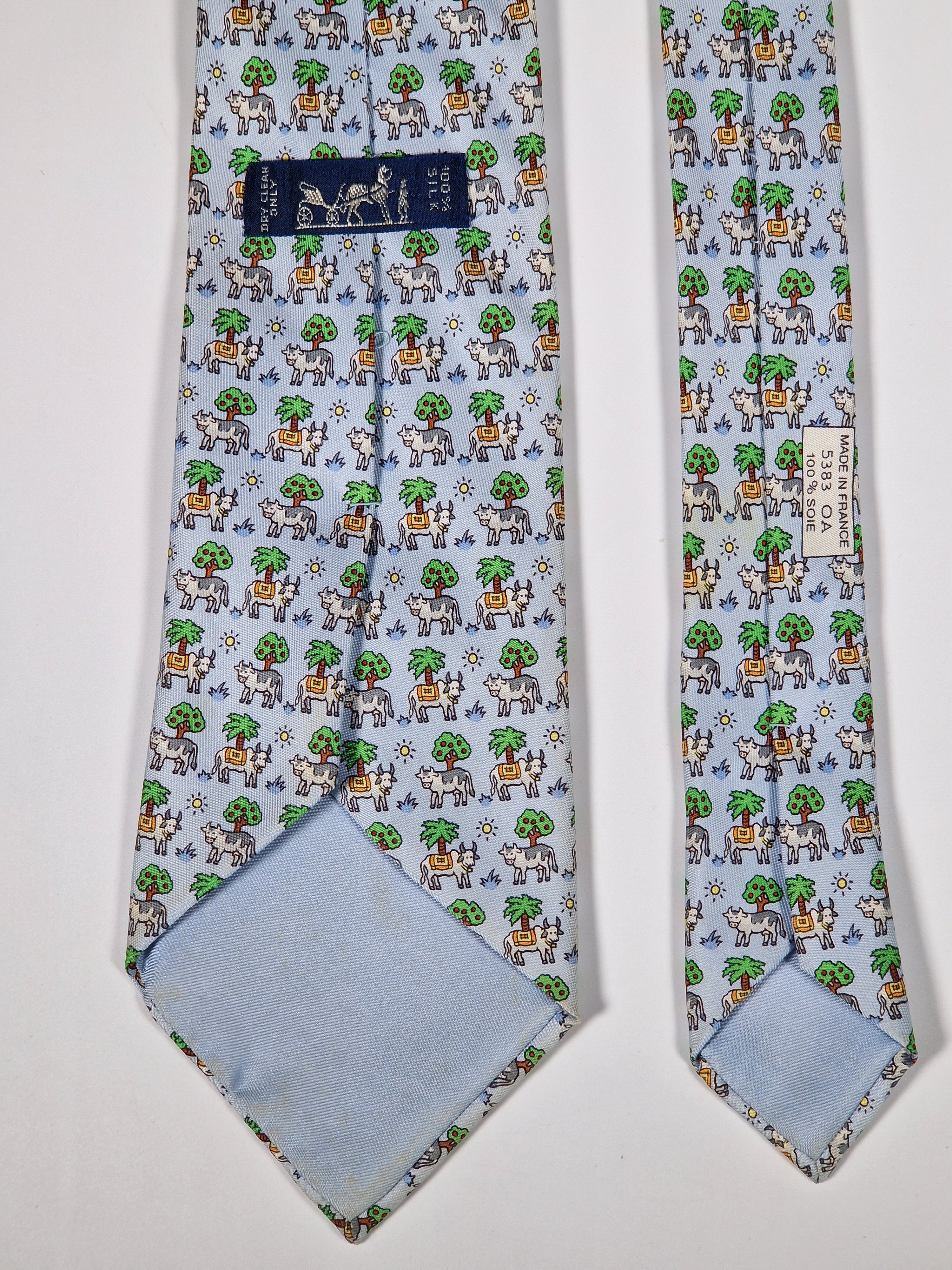 Hermès silk tie blue whimsical cow pattern 5383 OA
