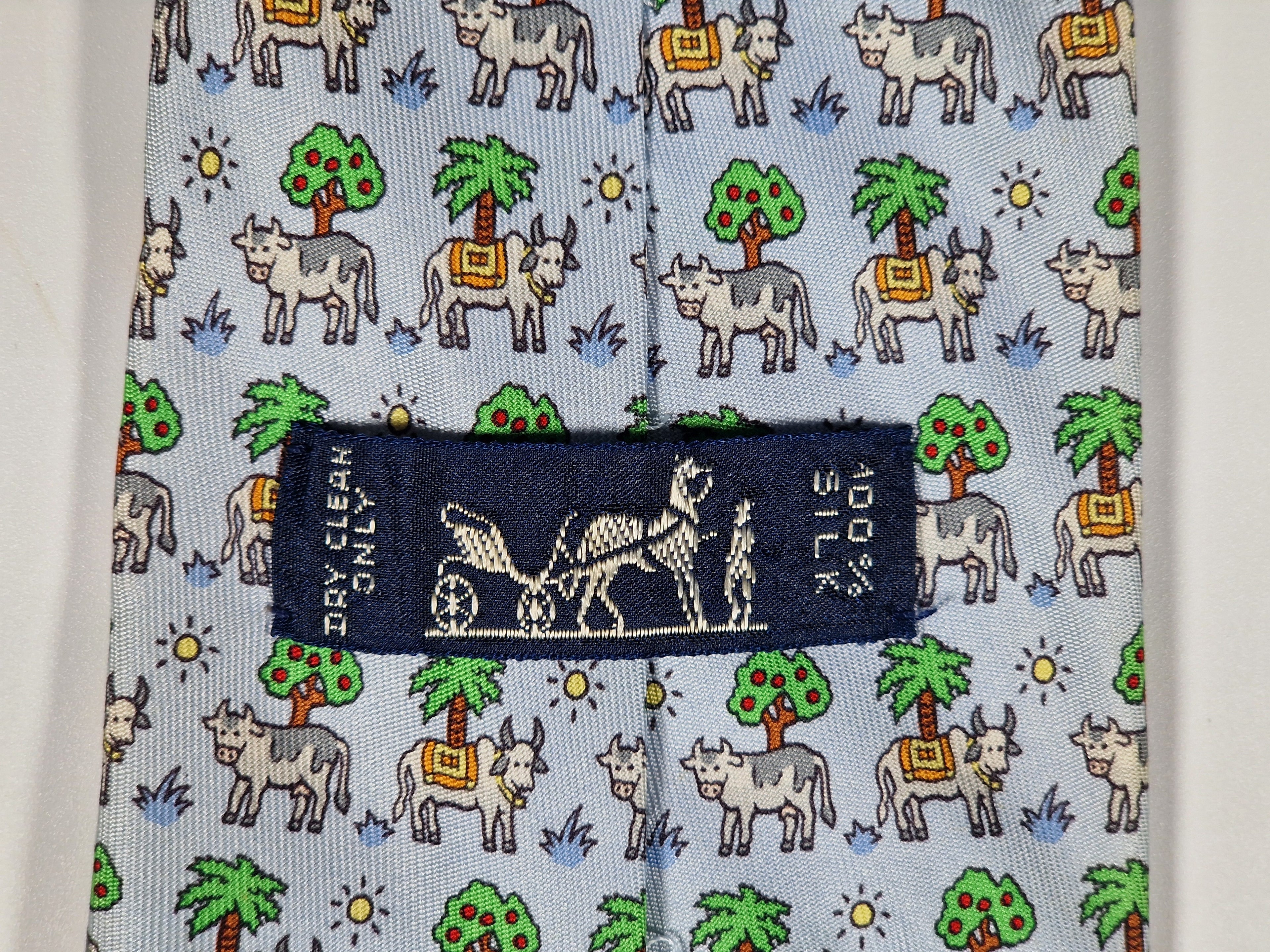 Hermès silk tie blue whimsical cow pattern 5383 OA
