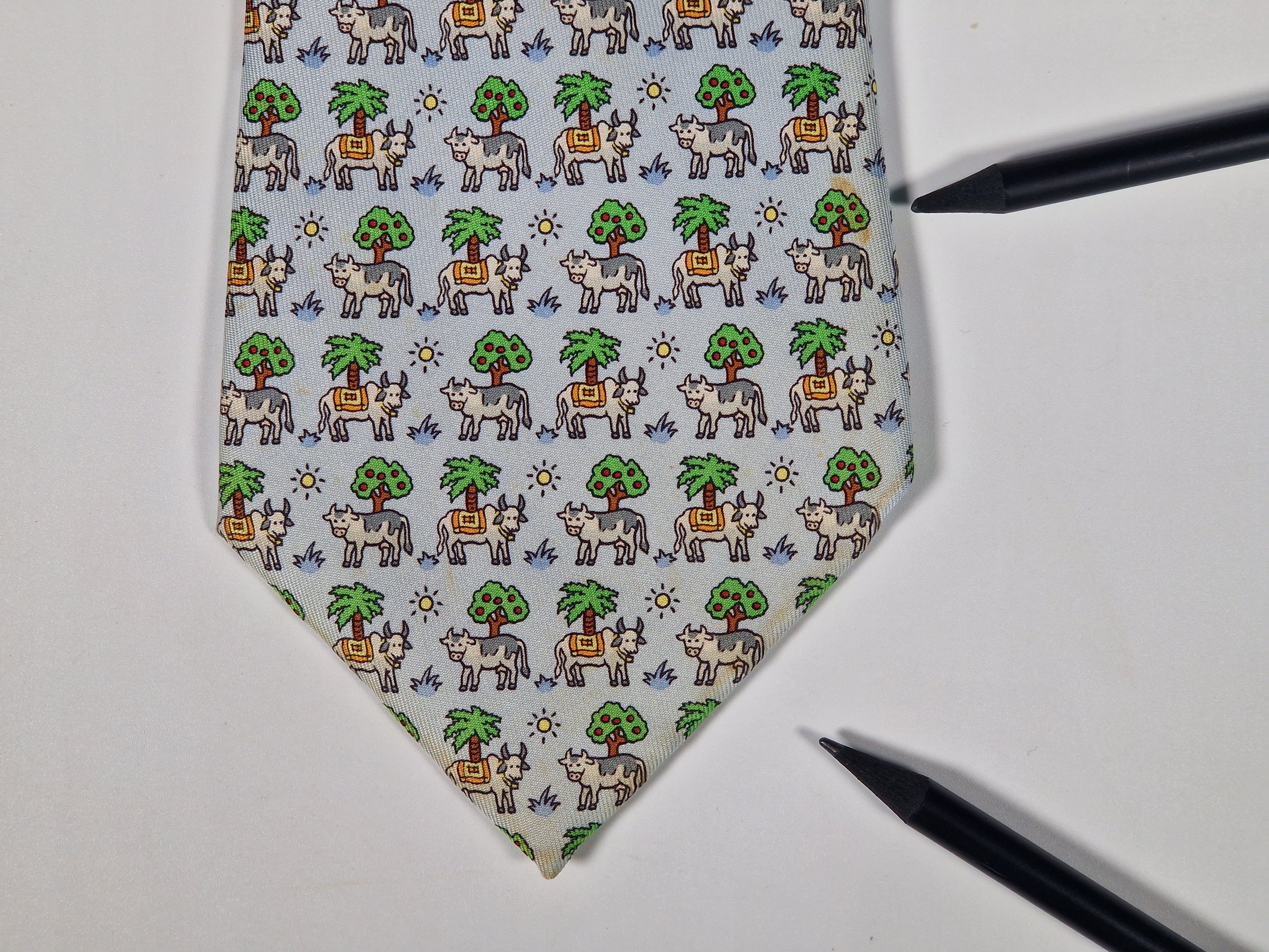 Hermès silk tie blue whimsical cow pattern 5383 OA