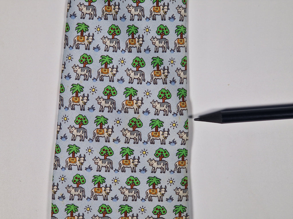 Hermès silk tie blue whimsical cow pattern 5383 OA