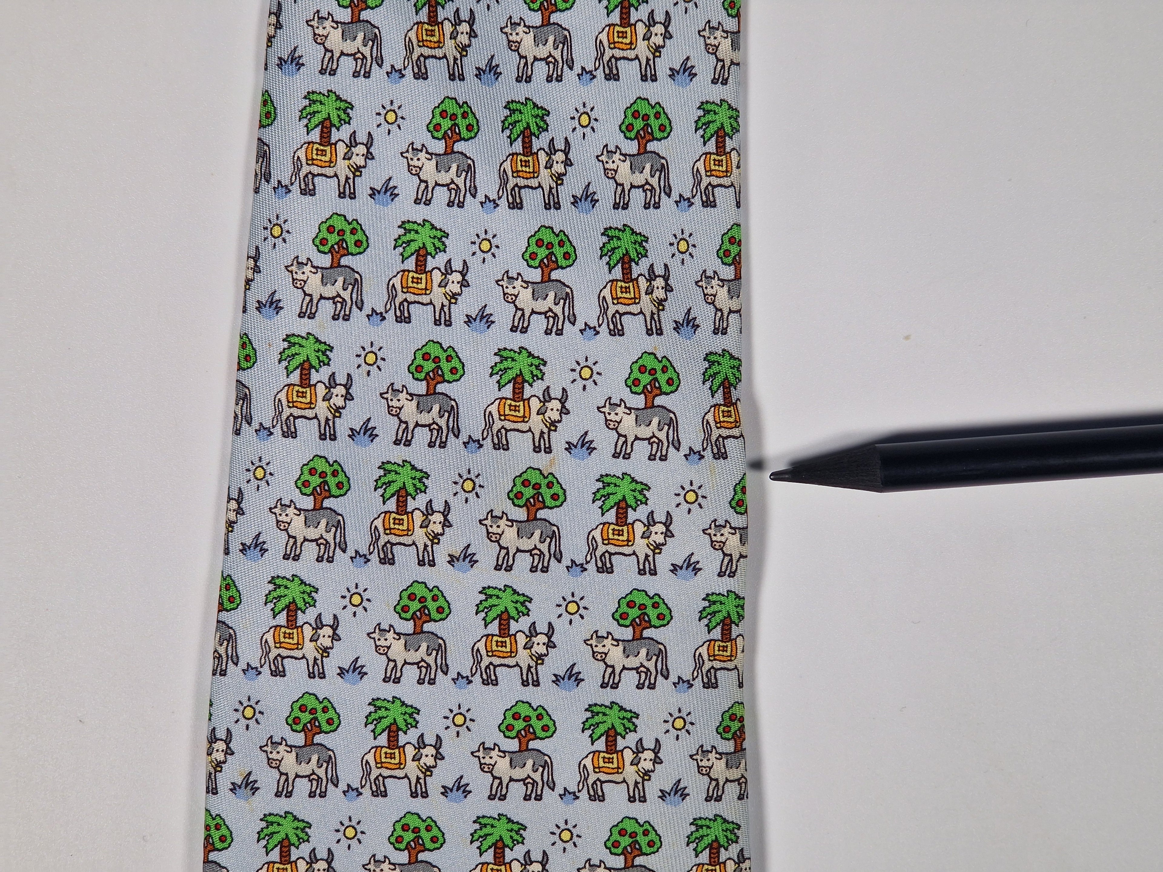 Hermès silk tie blue whimsical cow pattern 5383 OA