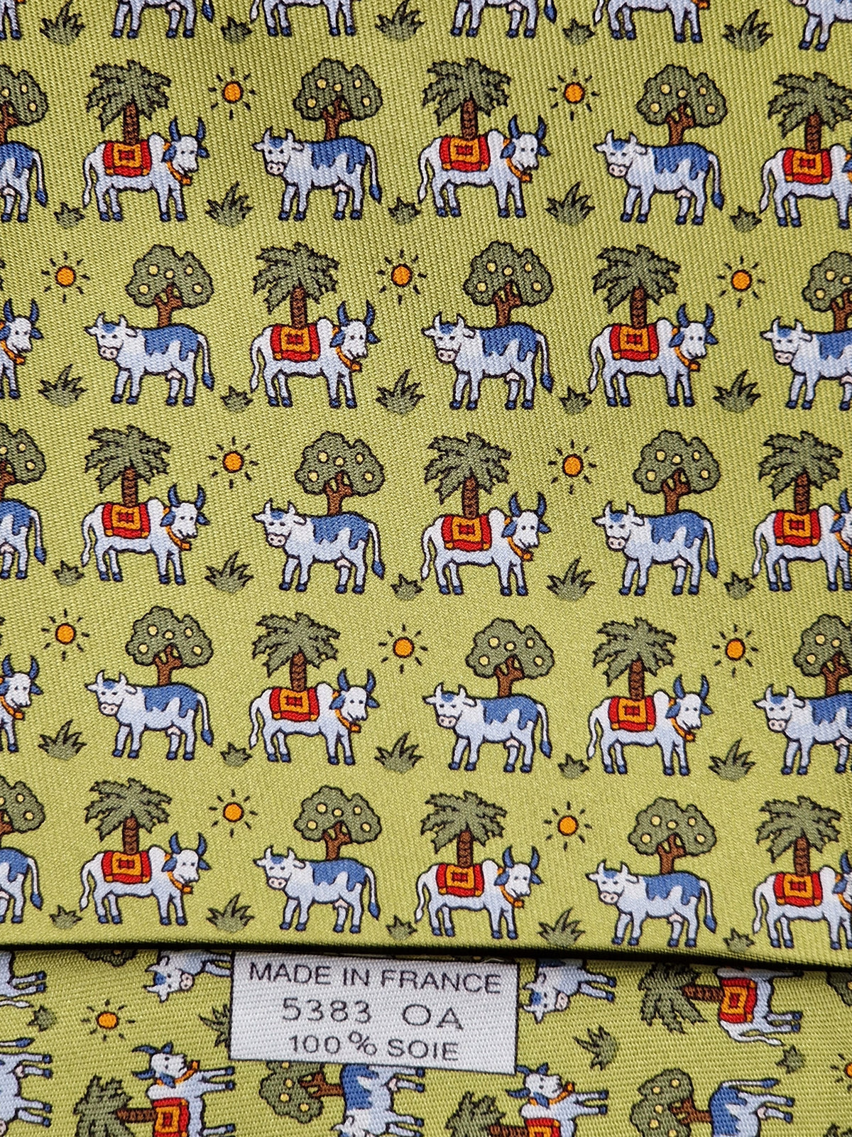005383 Hermès tie green Whimsical cows pattern 5383 OA