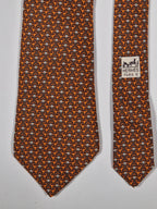 Hermès silk tie orange and brown monkey pattern 5384 oa