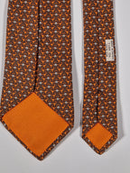 Hermès silk tie orange and brown monkey pattern 5384 oa