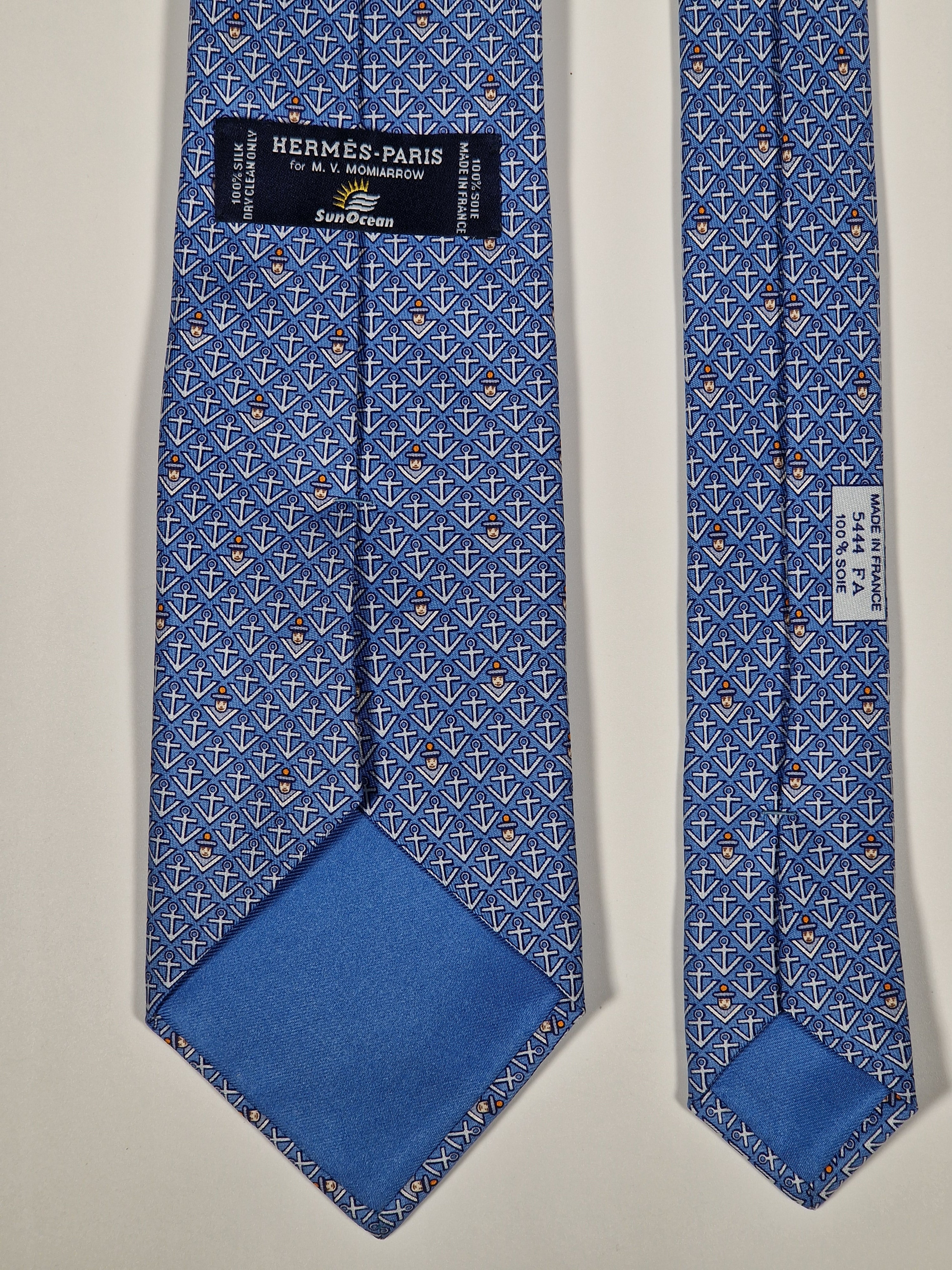 Hermès silk tie blue sailor and anchors "M.V.MOMIARROW SUNOCEAN" 5444 TA