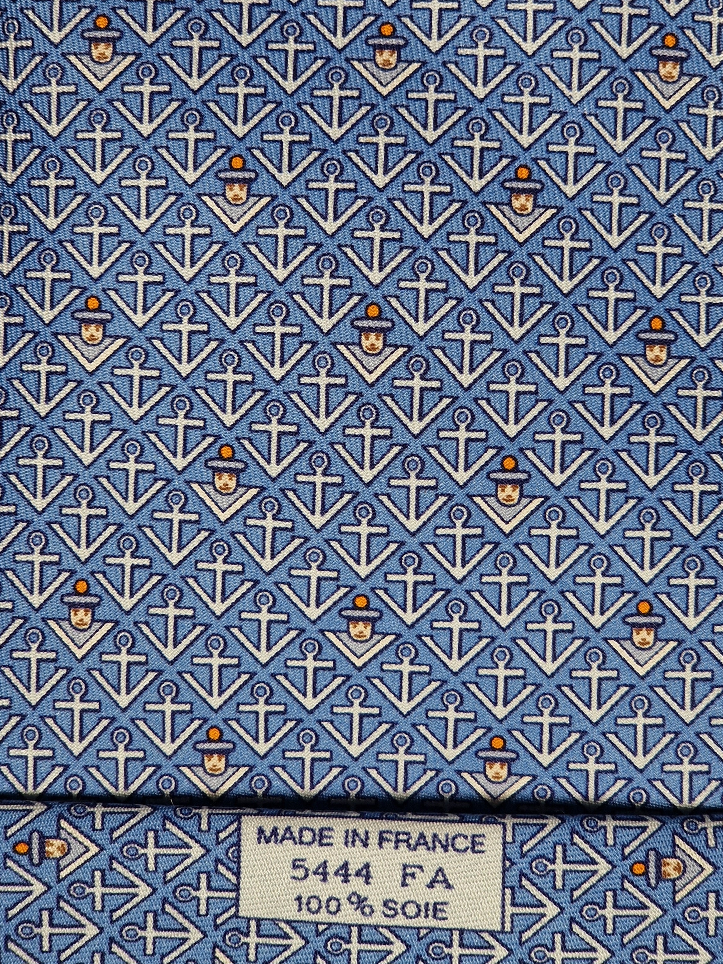 Hermès silk tie blue sailor and anchors "M.V.MOMIARROW SUNOCEAN" 5444 TA