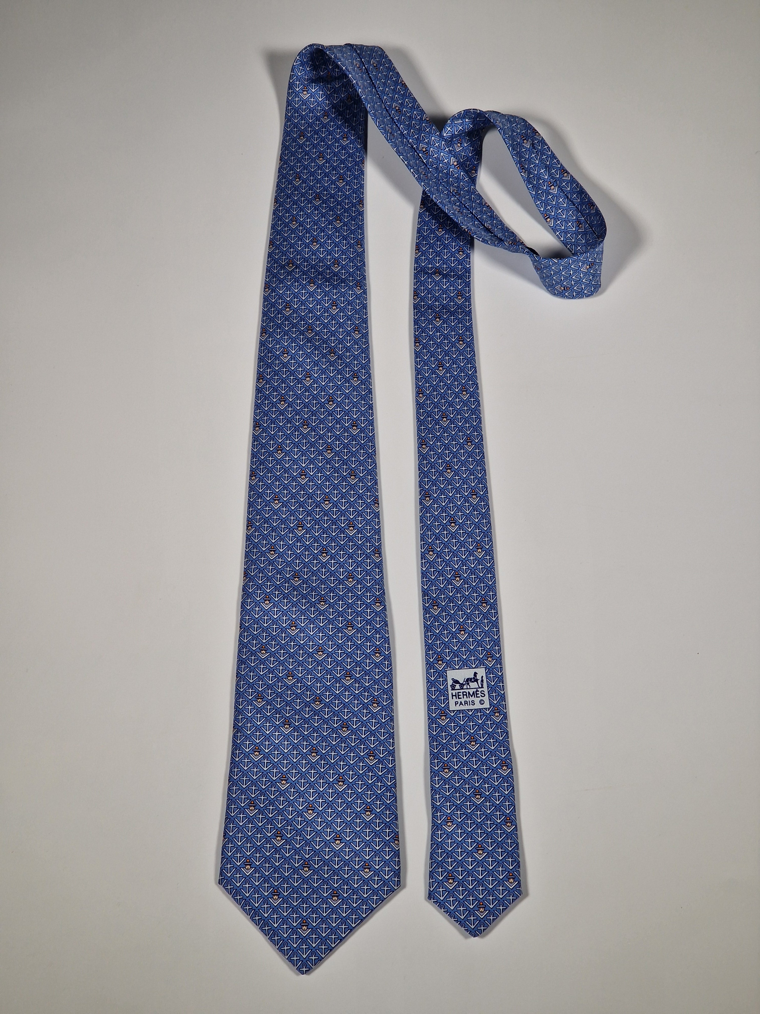 Hermès silk tie blue sailor and anchors "M.V.MOMIARROW SUNOCEAN" 5444 TA