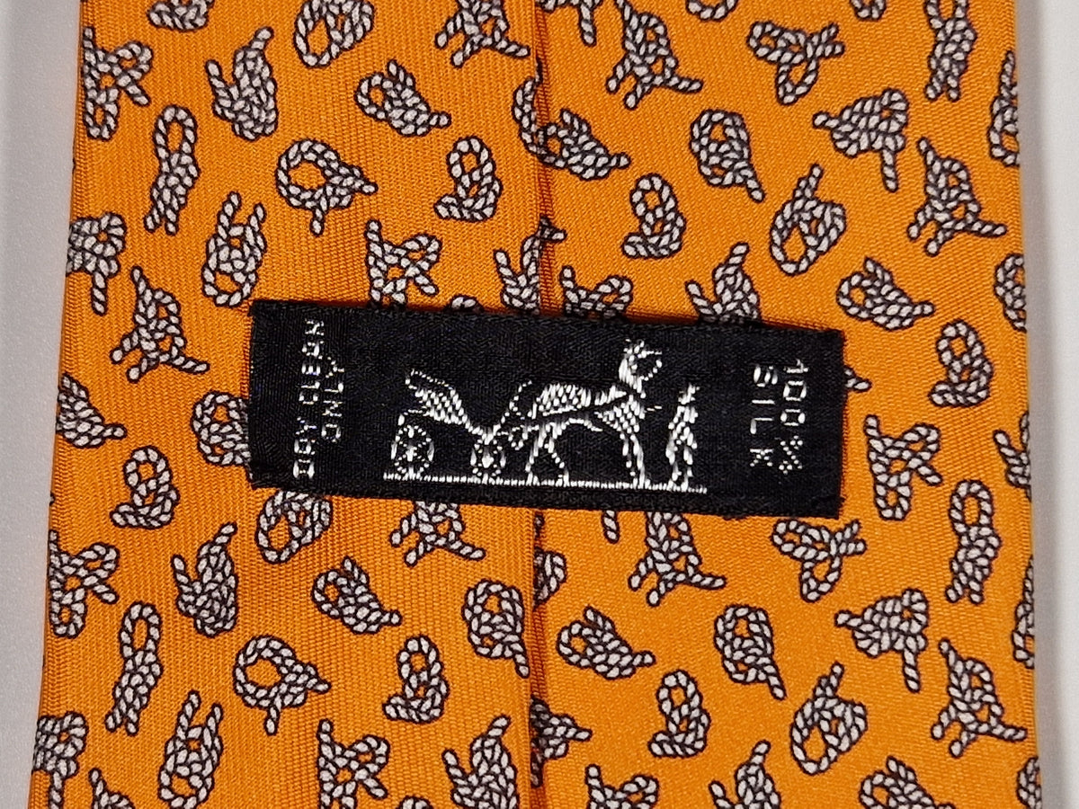 005561 Hermès tie orange knots Hermès 5561 MA tie orange