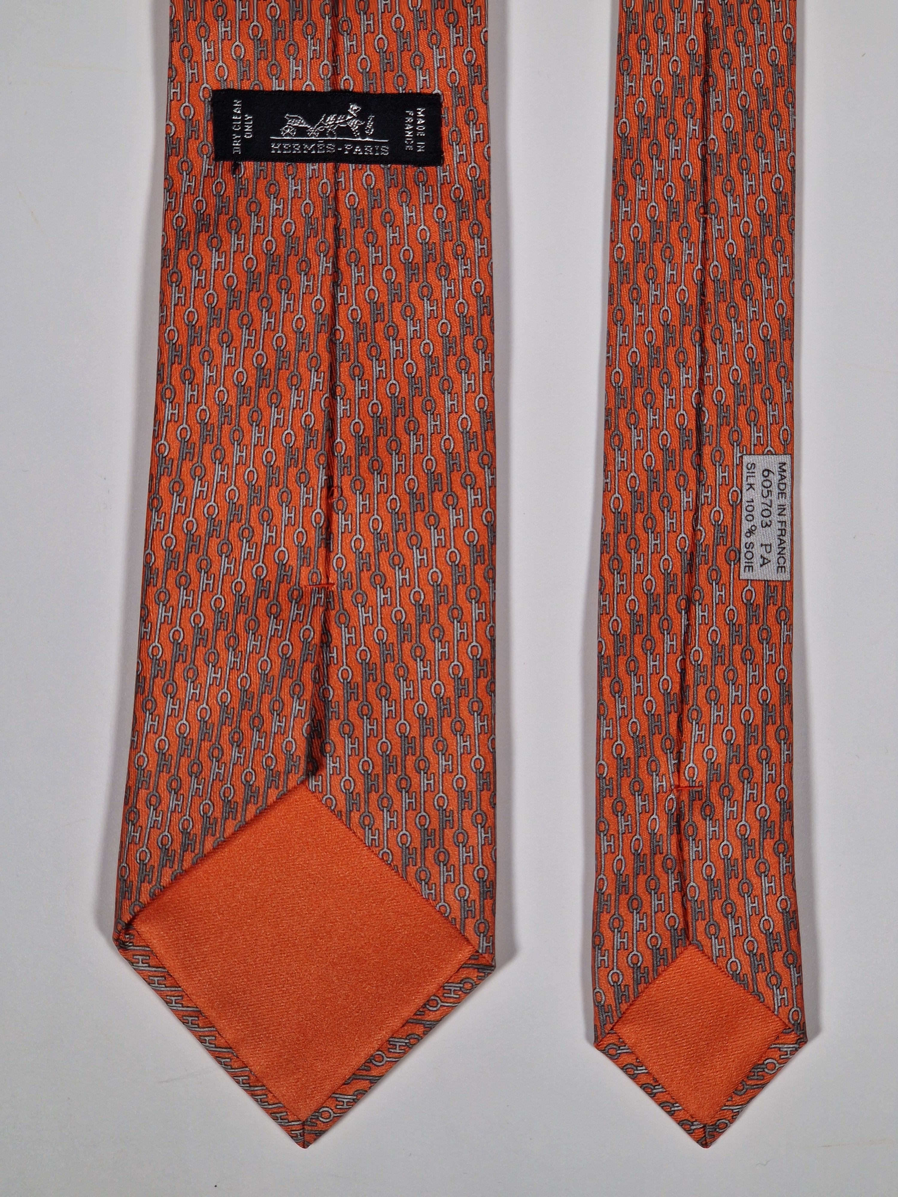 Hermès silk tie orange key pattern "UBS Bank Switzerland" 605703 FA