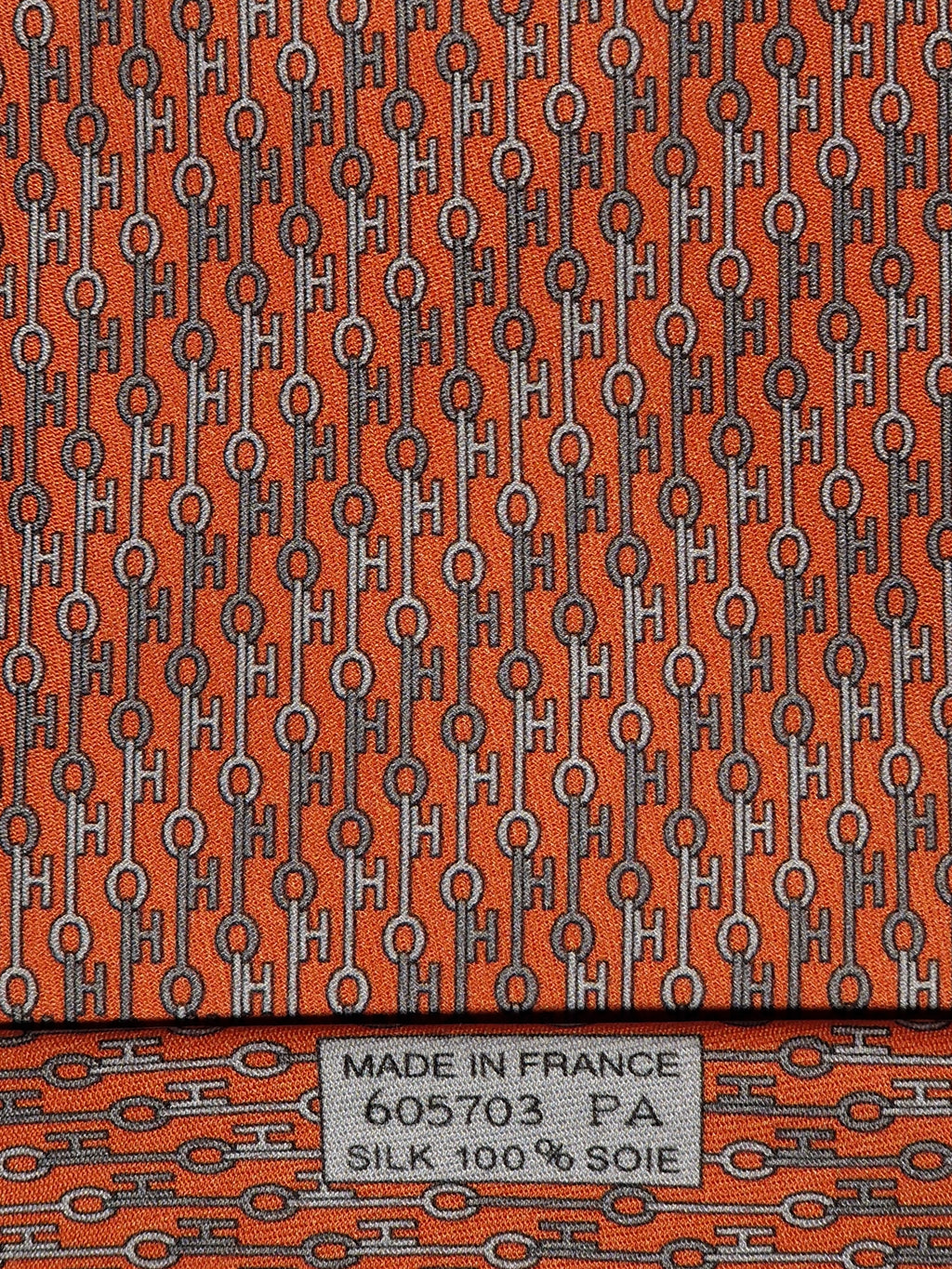 Hermès silk tie orange key pattern "UBS Bank Switzerland" 605703 FA