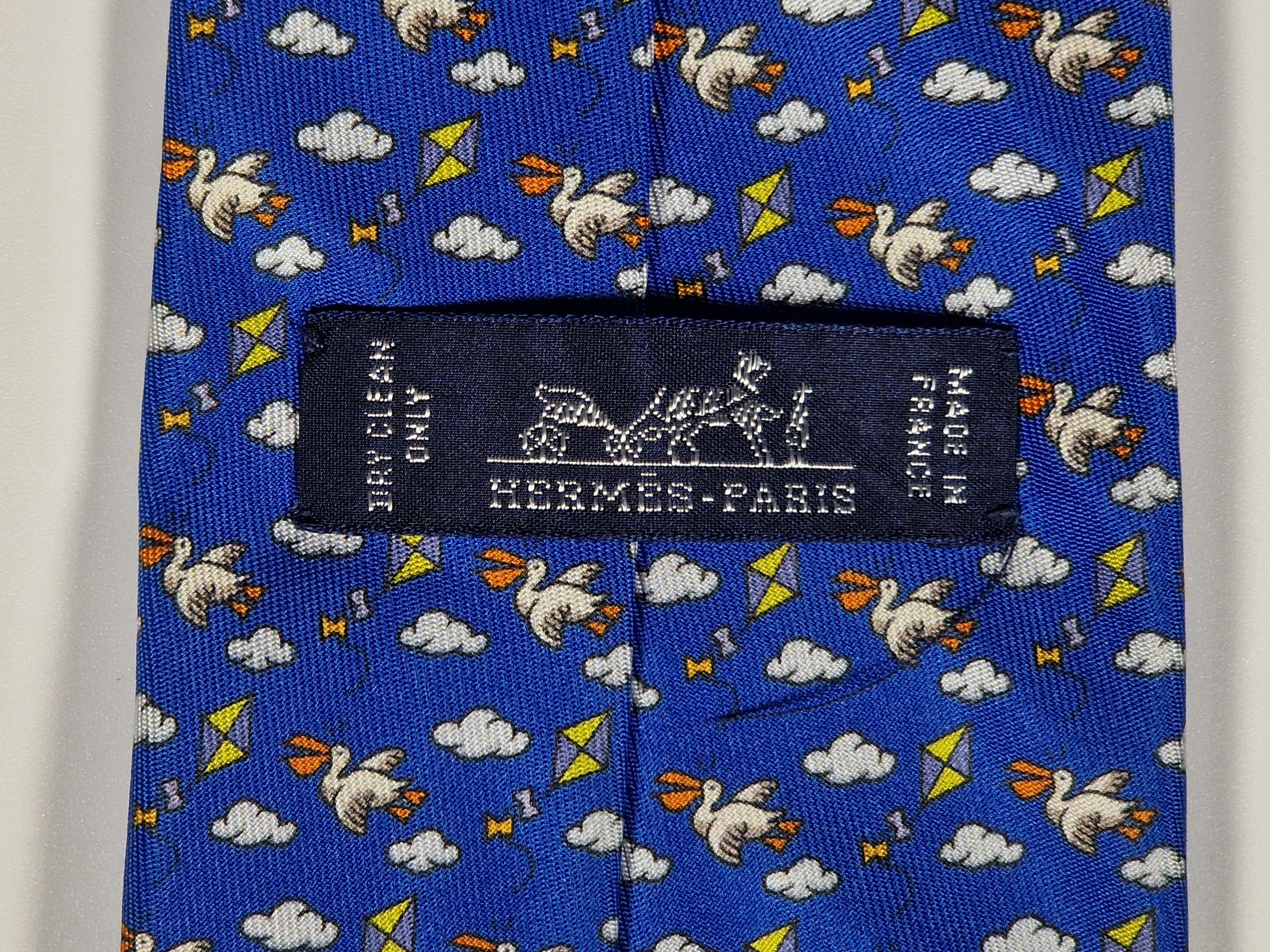 Hermès silk tie blue bird and kite whimsical pattern 605749 HA