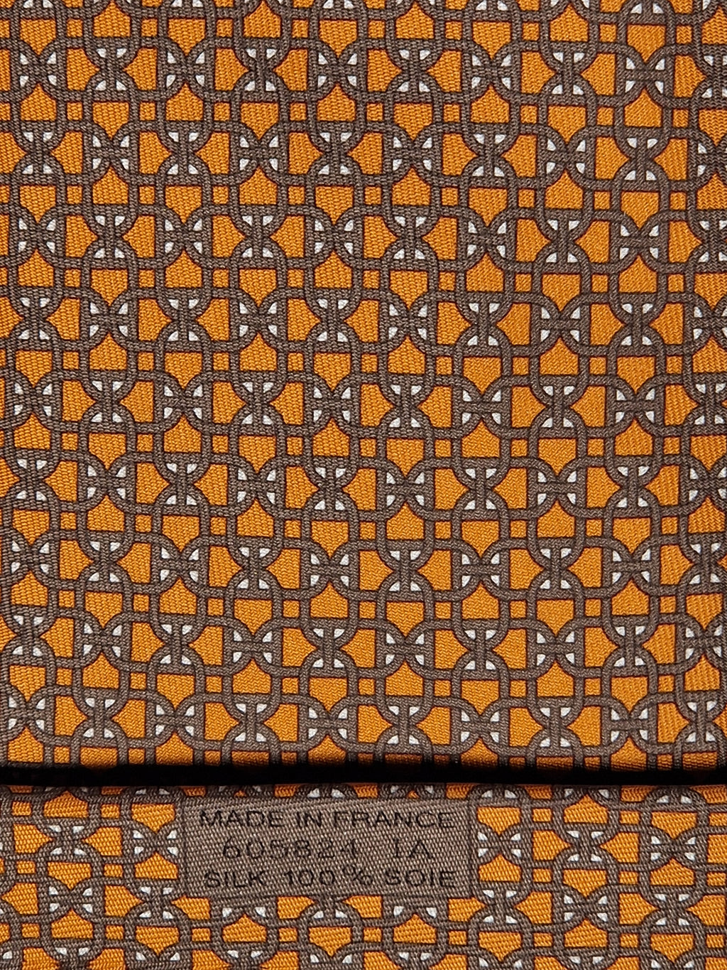 Hermès silk tie orange chain pattern 605824 IA