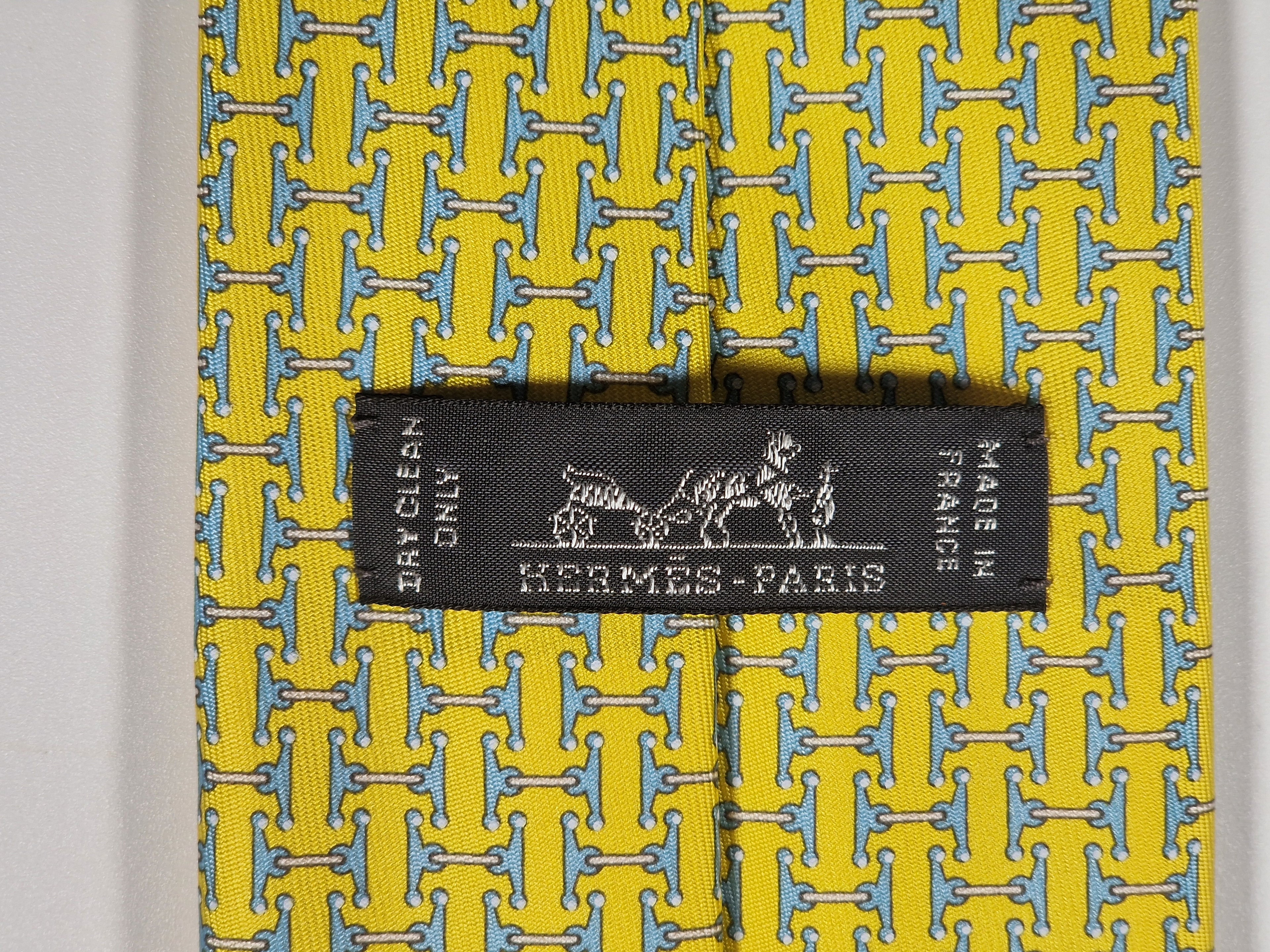 Hermès silk tie yellow equestrian H pattern 606236 MA