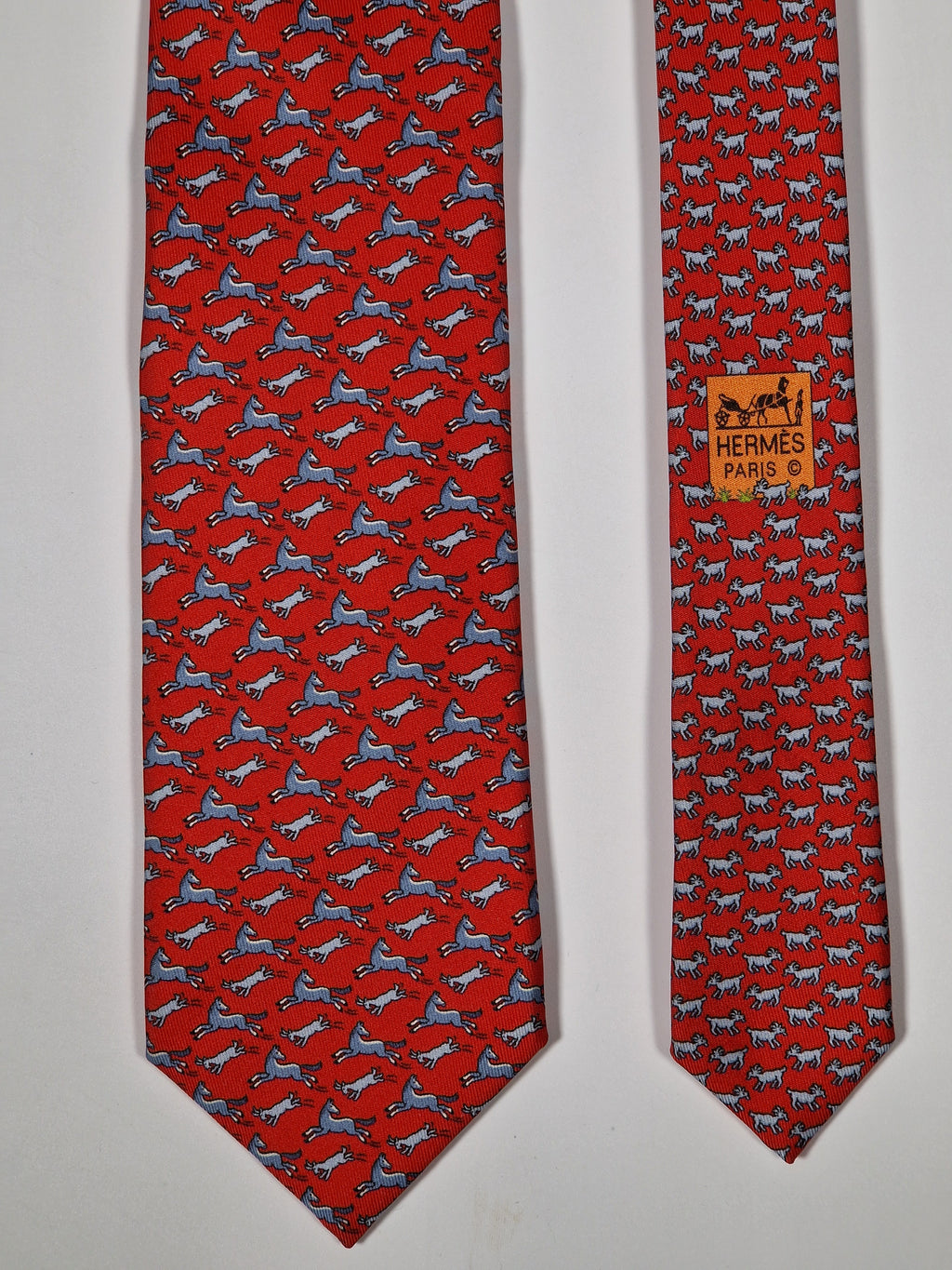 Hermès silk tie red whimsical horse and goat pattern 625800 HA