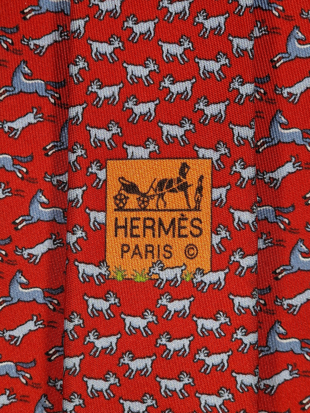 Hermès silk tie red whimsical horse and goat pattern 625800 HA