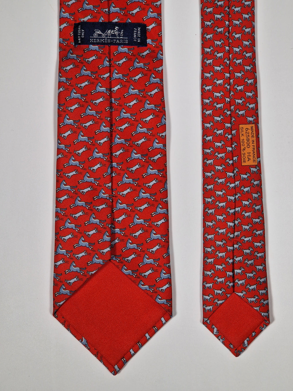 Hermès silk tie red whimsical horse and goat pattern 625800 HA