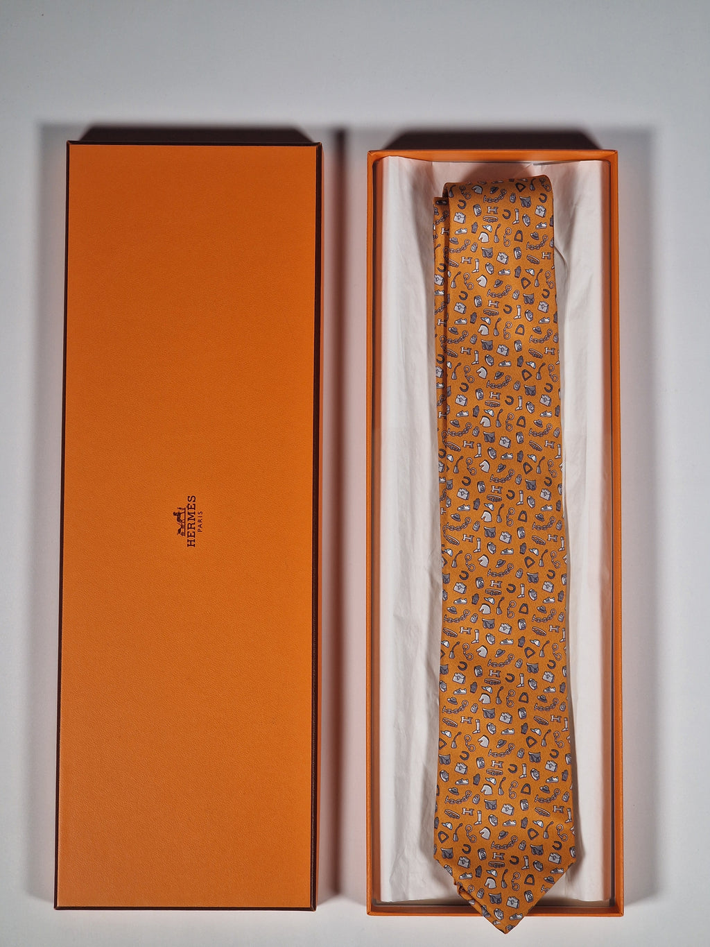 Hermès silk tie orange quincaillerie du faub pattern 6354 HA with box