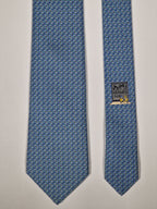Hermès silk tie blue helmet whimsical pattern 645861 IA