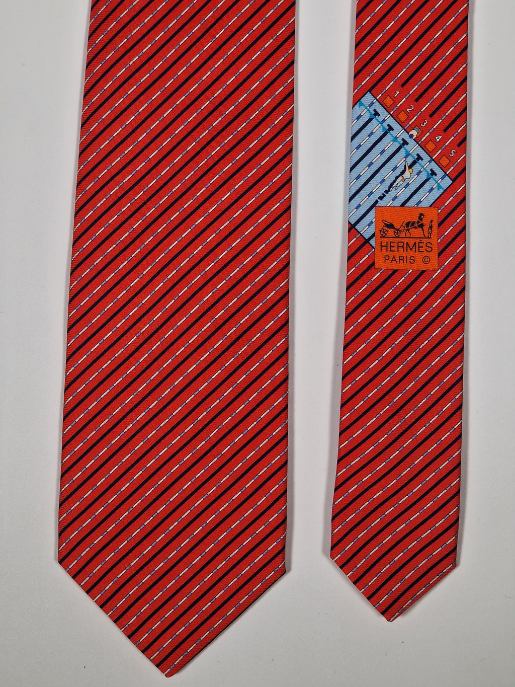 Hermès silk tie red swimming lanes pattern 646081 FA
