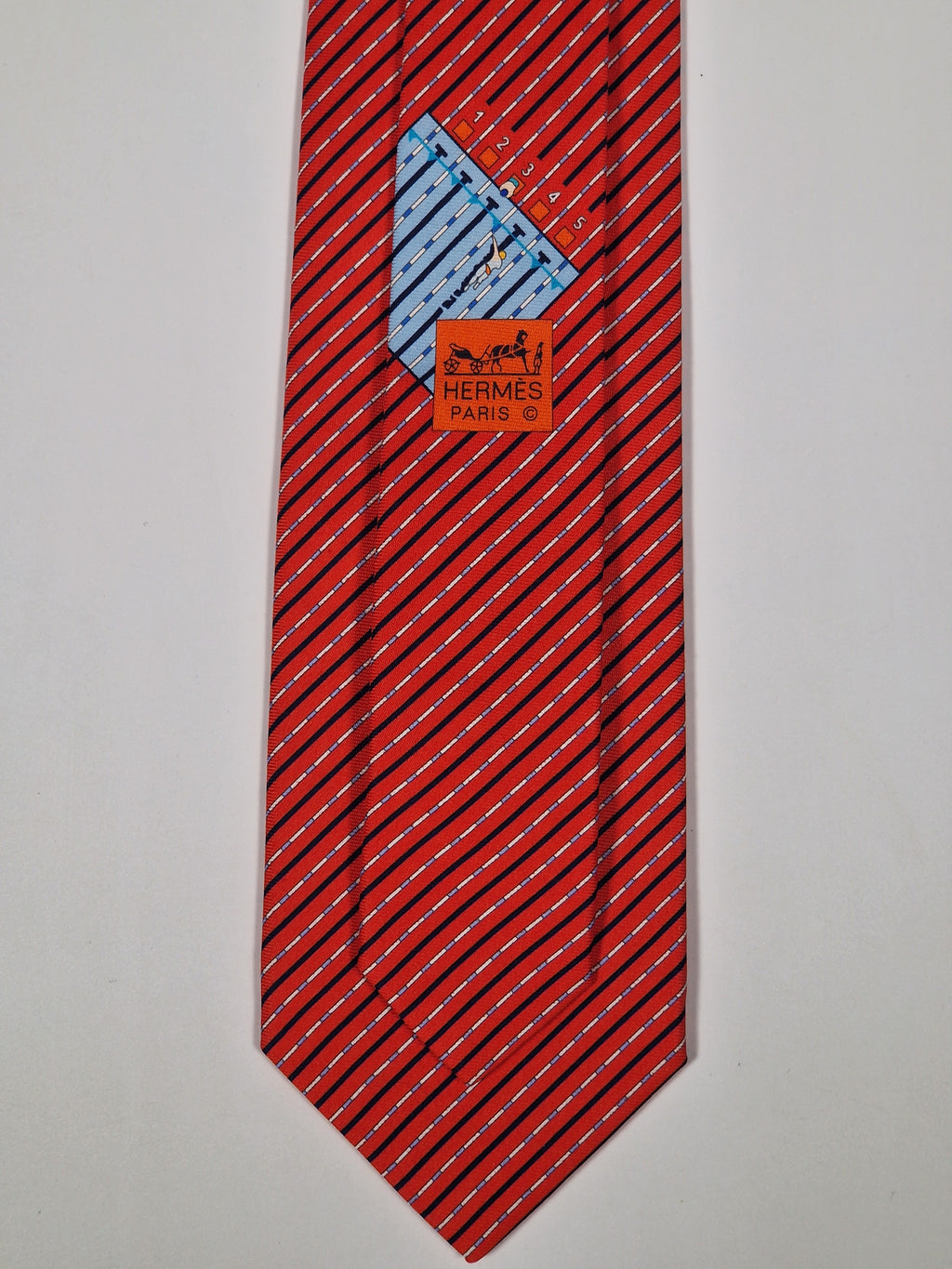 Hermès silk tie red swimming lanes pattern 646081 FA