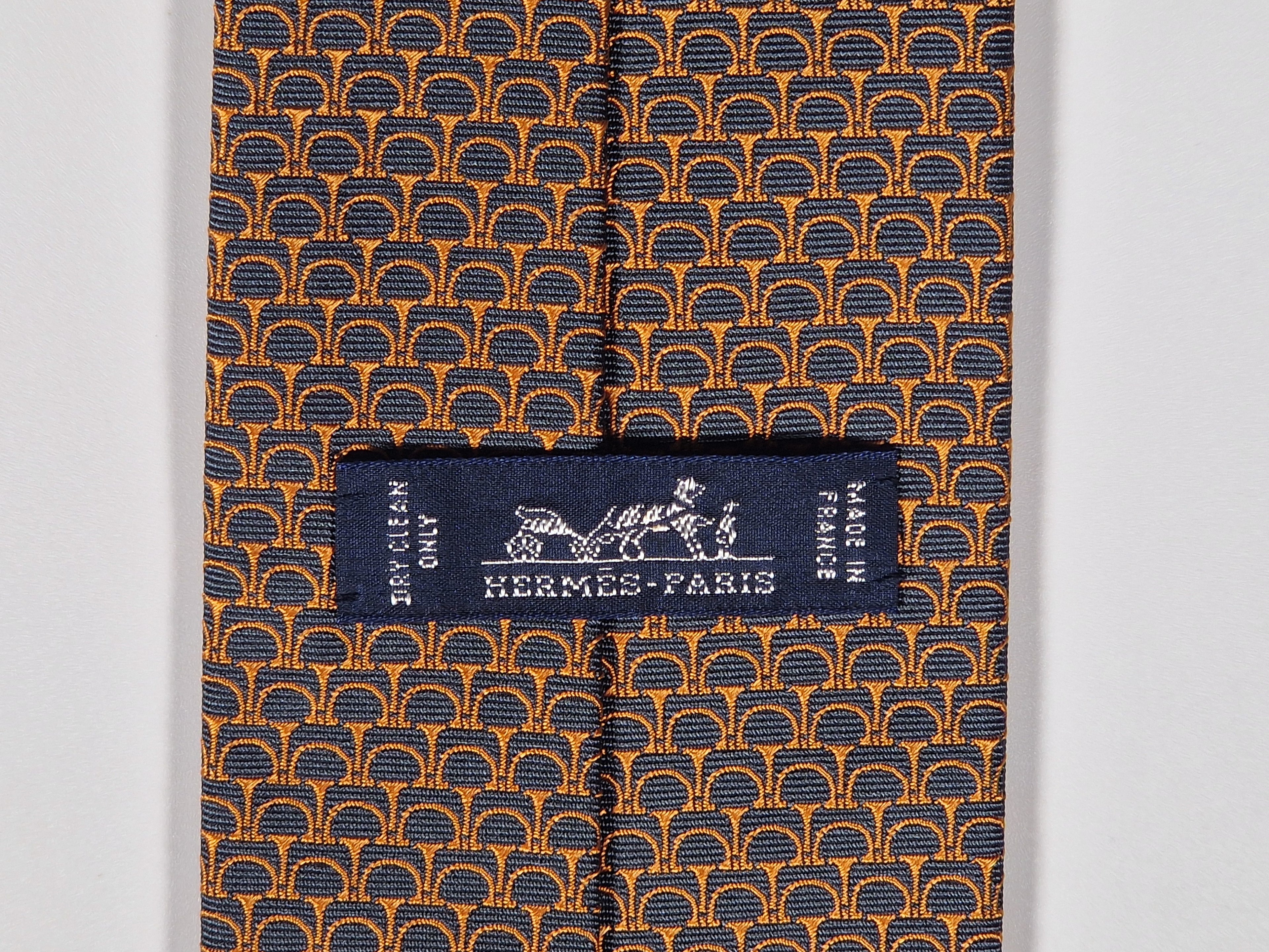 Hermès jacquard silk tie orange brown equestrian pattern 655523 T