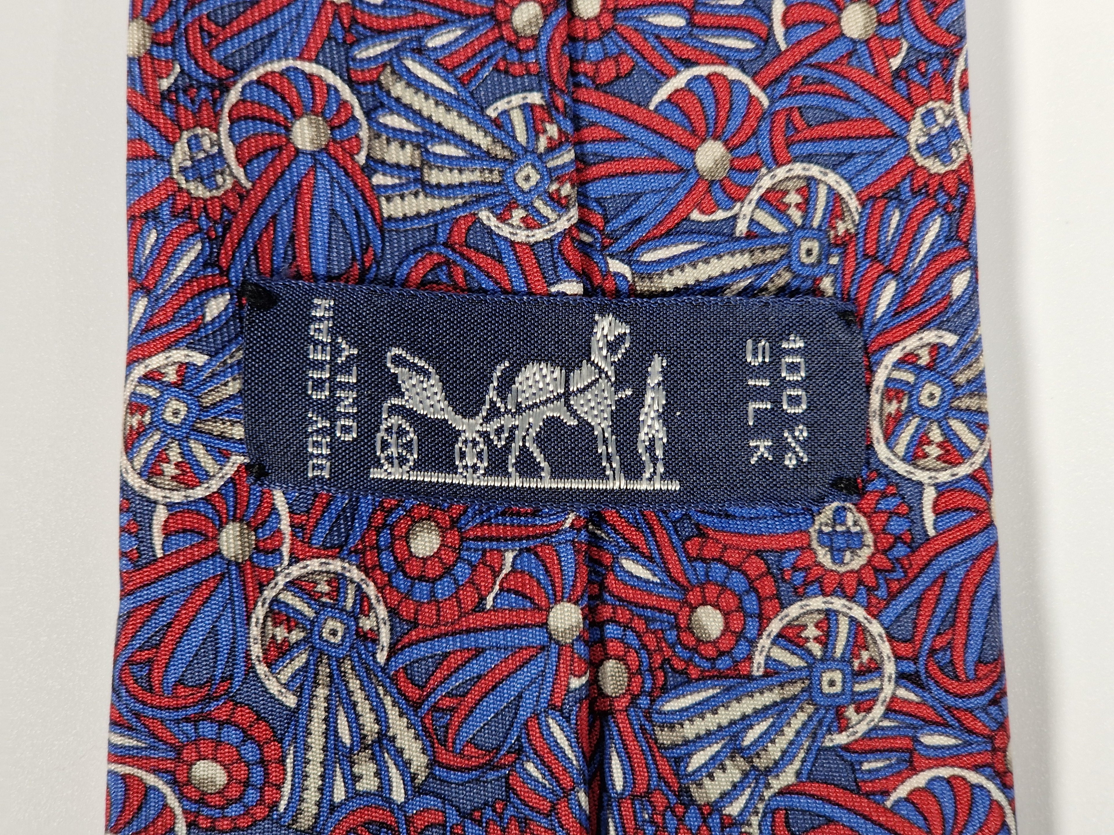 Hermés silk tie, purple and blue rosettes 7170 FA