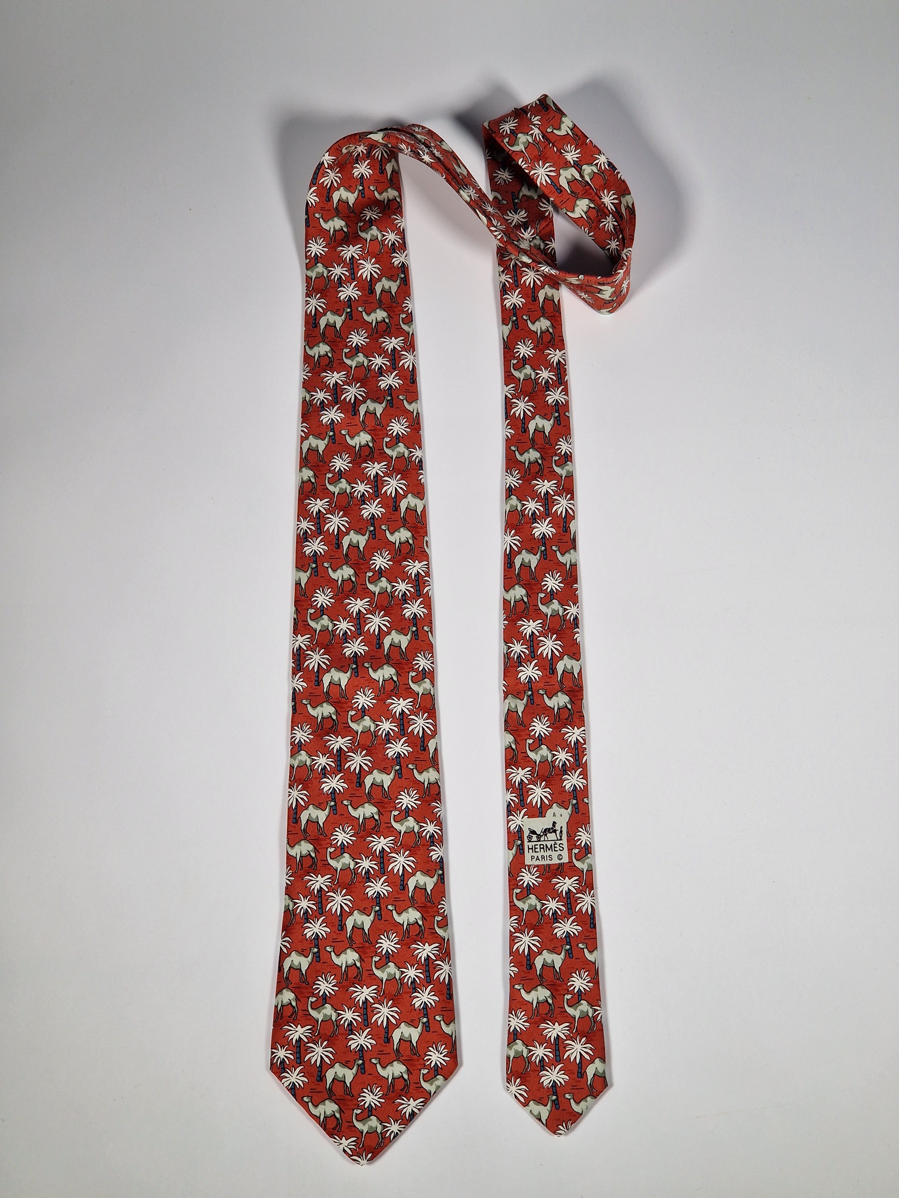 Hermès silk tie red Dromedaries and palm trees whimsical pattern 7418 HA