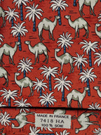 Hermès silk tie red Dromedaries and palm trees whimsical pattern 7418 HA