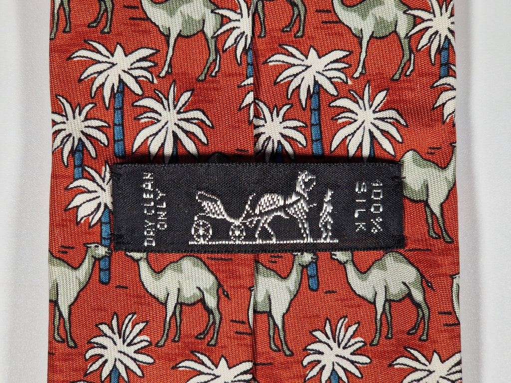 Hermès silk tie red Dromedaries and palm trees whimsical pattern 7418 HA