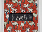 Hermès silk tie red Dromedaries and palm trees whimsical pattern 7418 HA