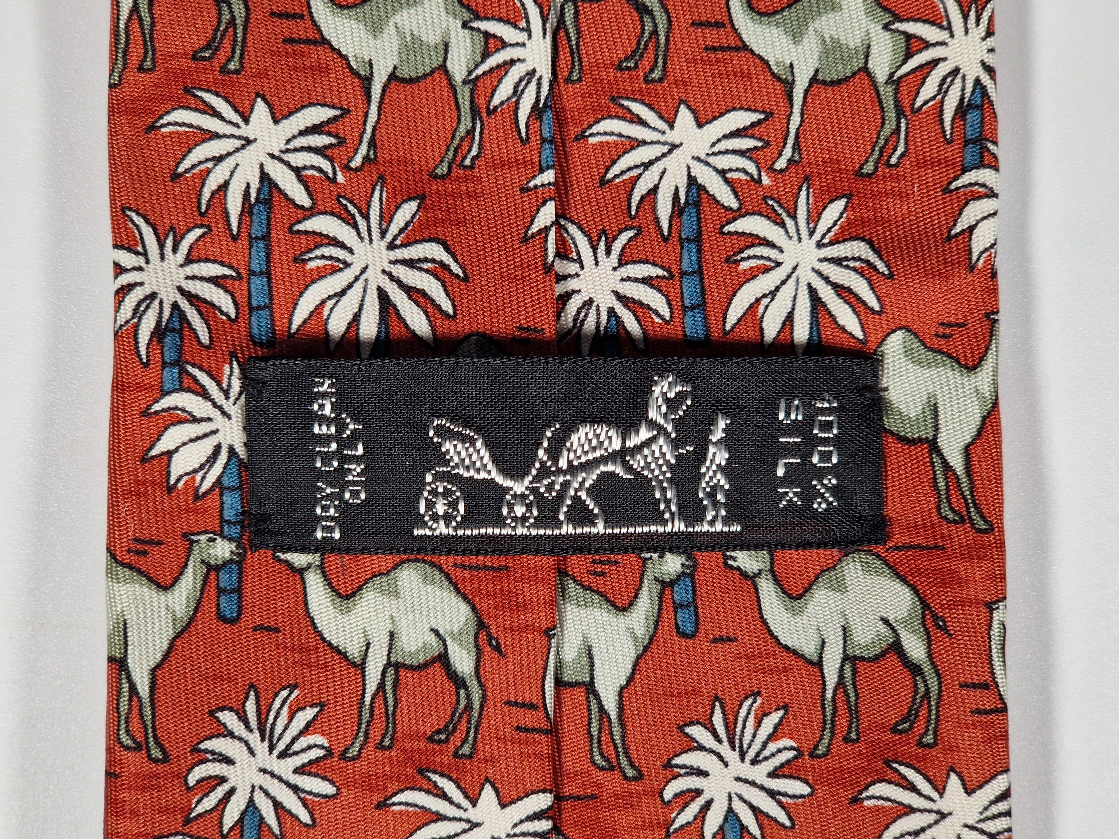 Hermès silk tie red Dromedaries and palm trees whimsical pattern 7418 HA