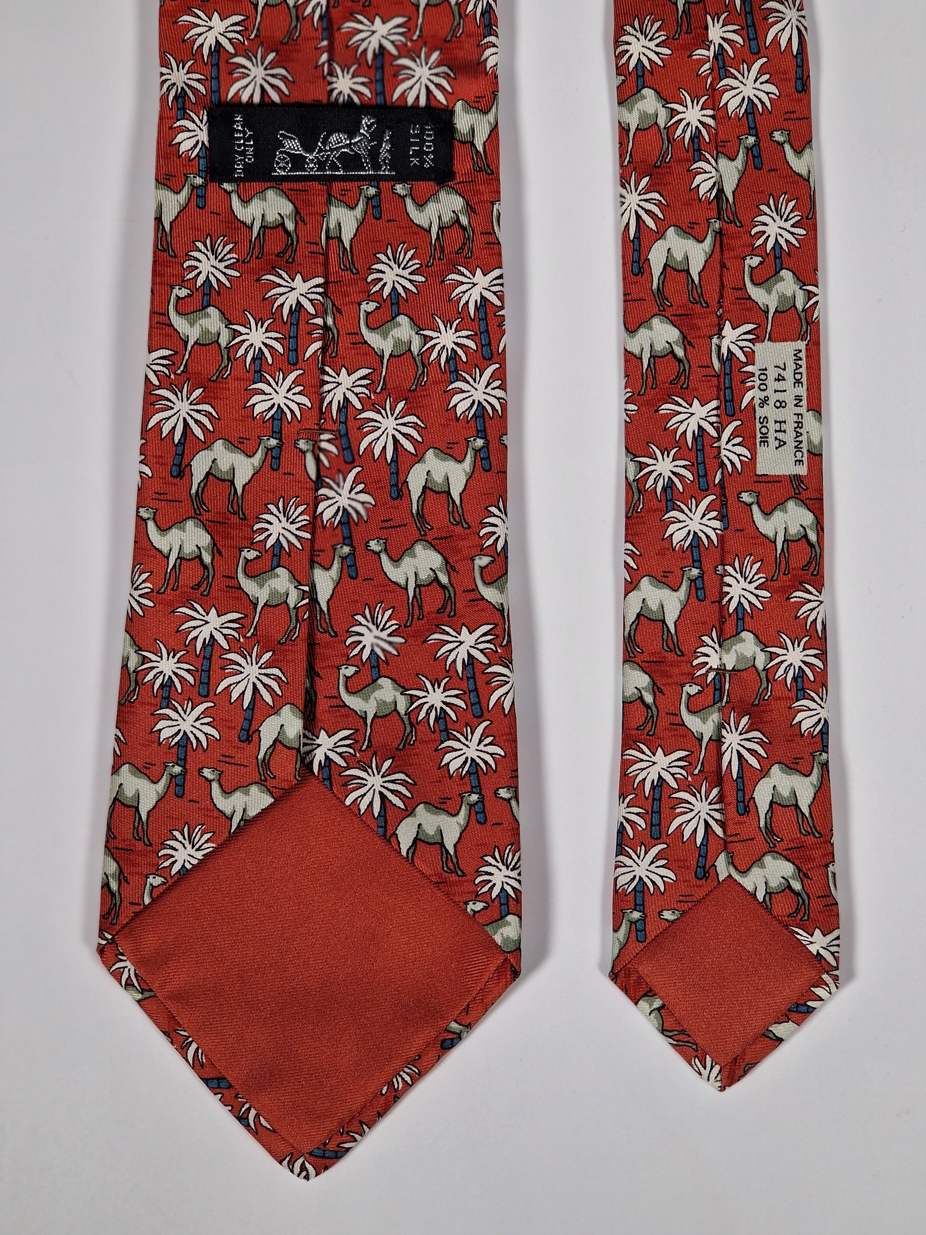 Hermès silk tie red Dromedaries and palm trees whimsical pattern 7418 HA