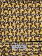 Hermès silk tie yellow horseshoe equestrian pattern 7523 IA