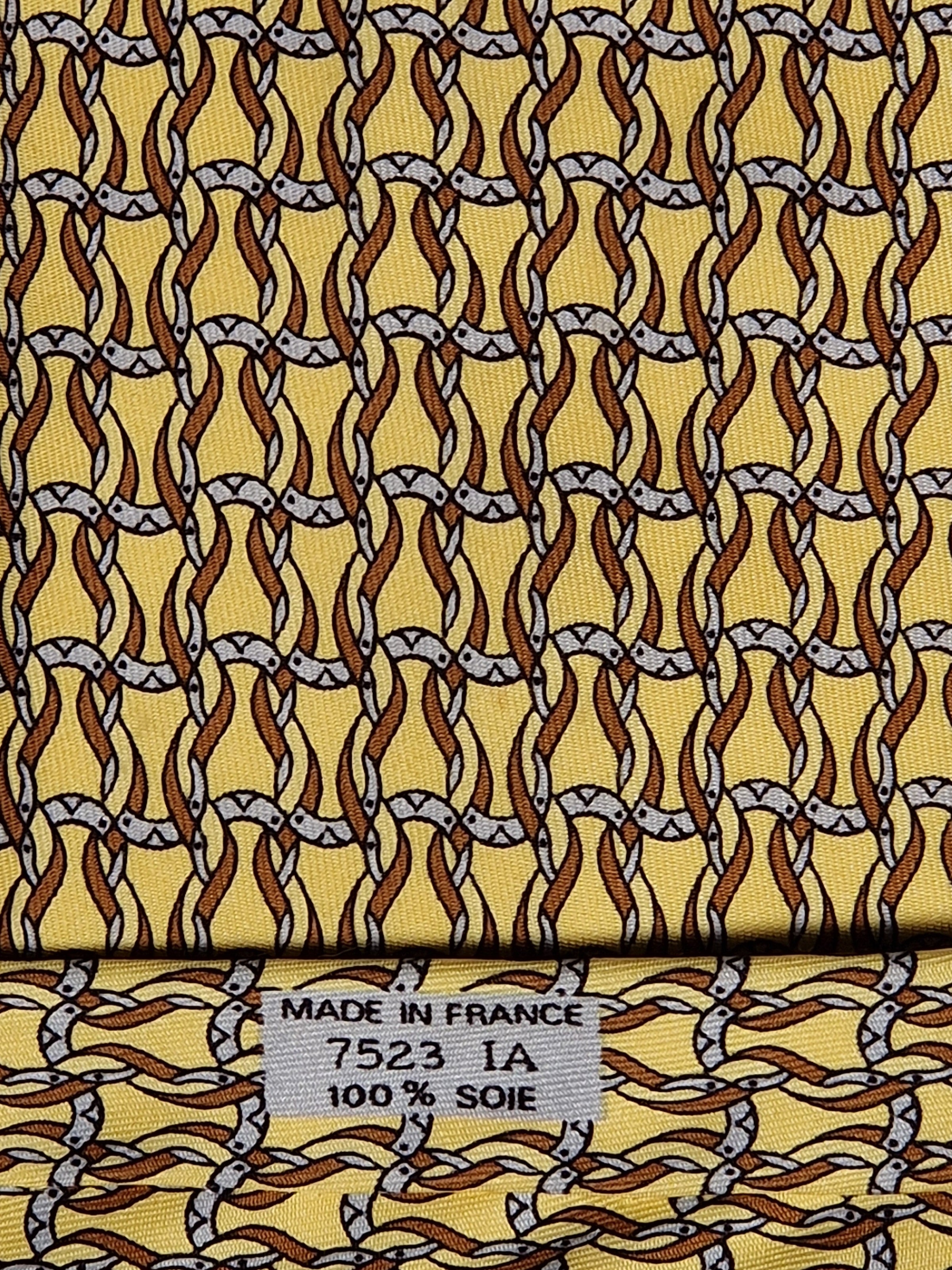 Hermès silk tie yellow horseshoe equestrian pattern 7523 IA