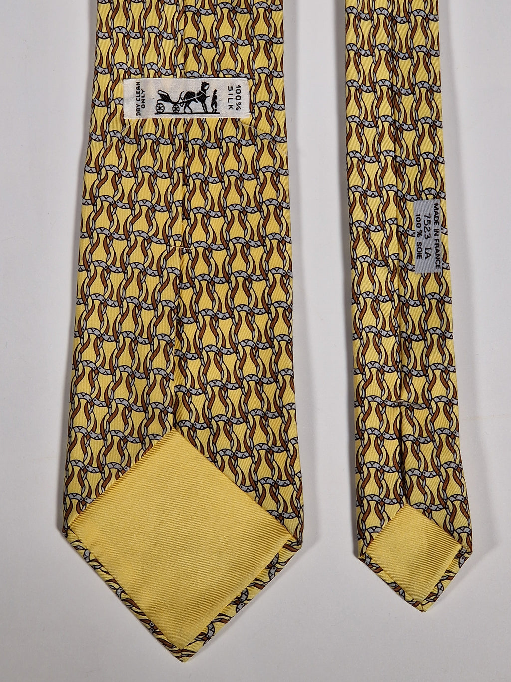 Hermès silk tie yellow horseshoe equestrian pattern 7523 IA