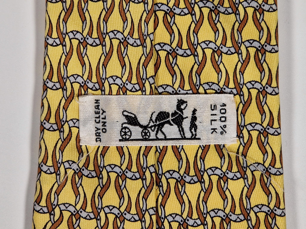 Hermès silk tie yellow horseshoe equestrian pattern 7523 IA