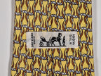 Hermès silk tie yellow horseshoe equestrian pattern 7523 IA