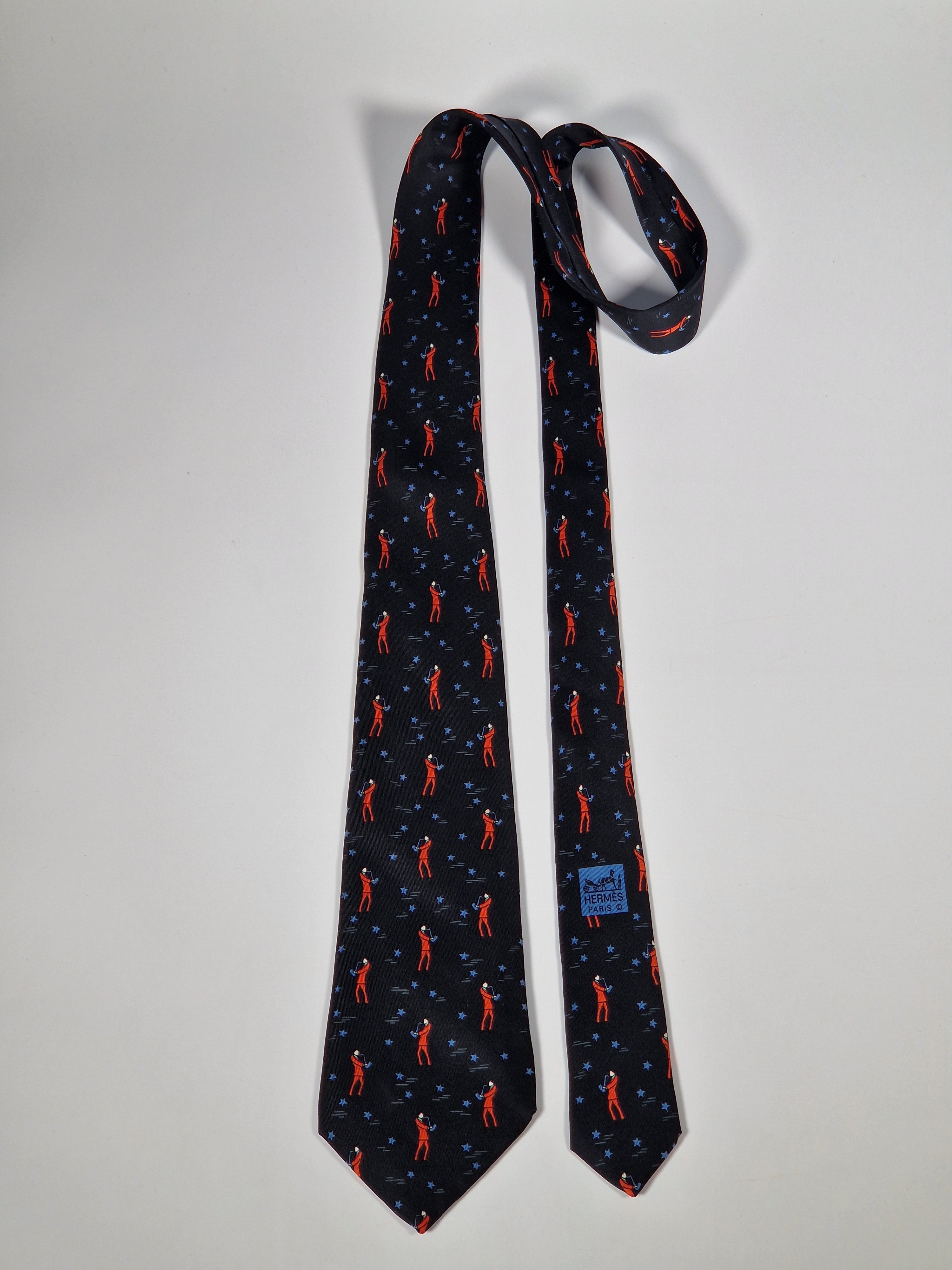 Hermès silk tie black saxophone player whimsical pattern 7551 SA