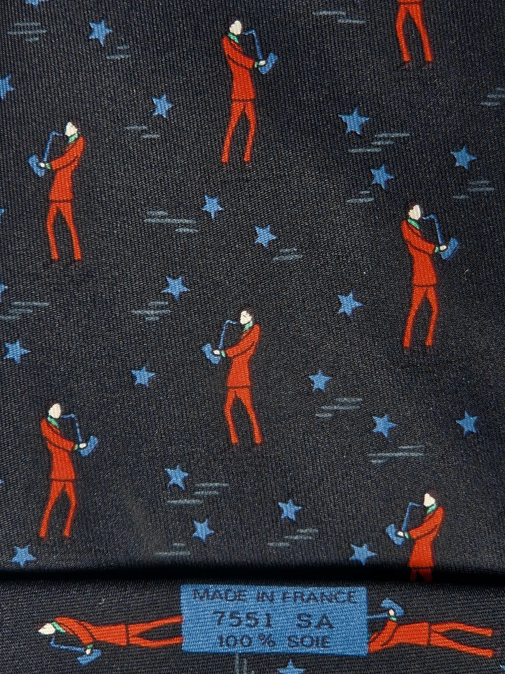 Hermès silk tie black saxophone player whimsical pattern 7551 SA