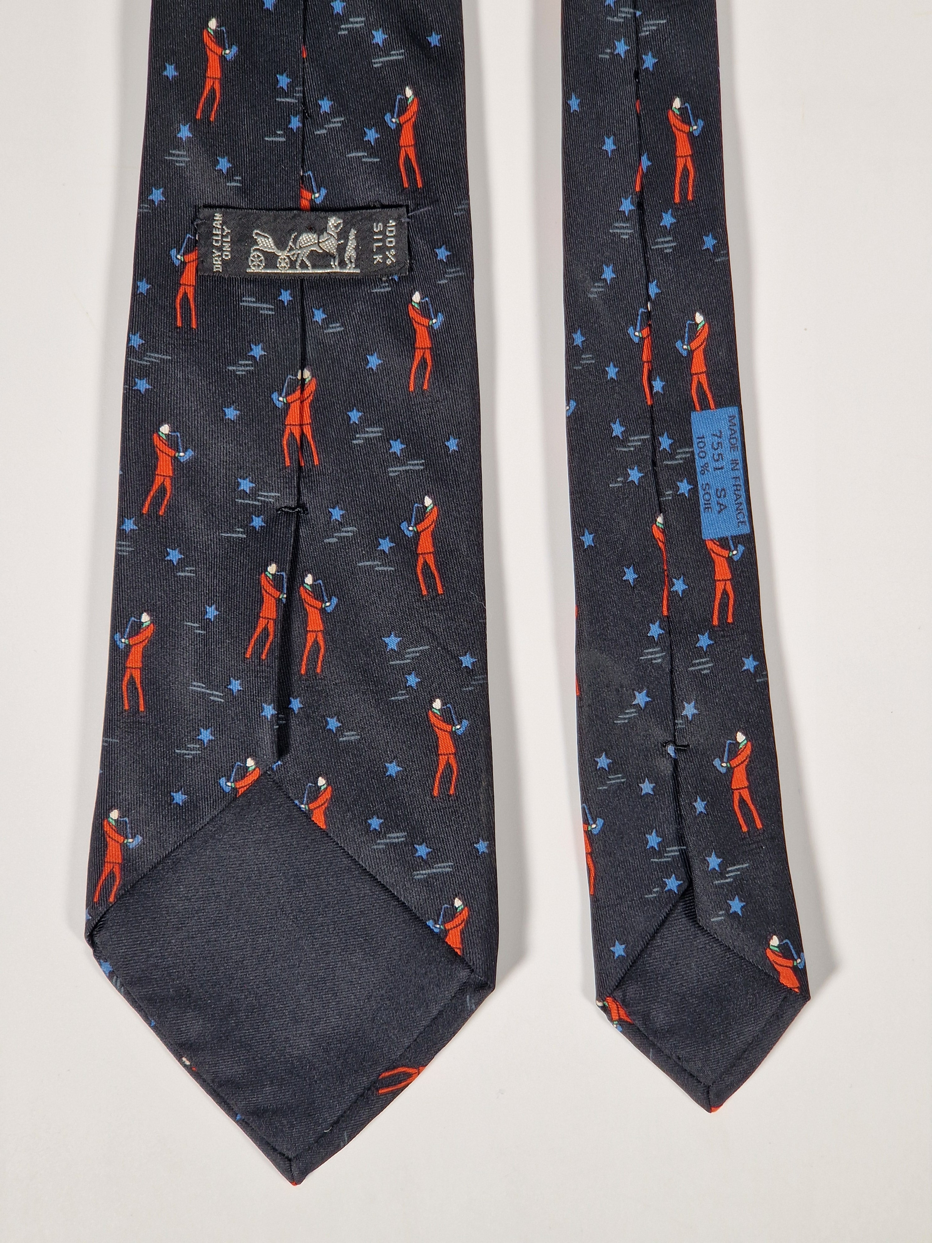 Hermès silk tie black saxophone player whimsical pattern 7551 SA