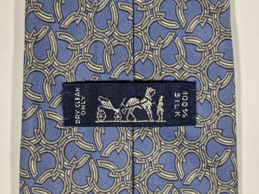Hermès silk tie blue horse shoe pattern 7581 SA