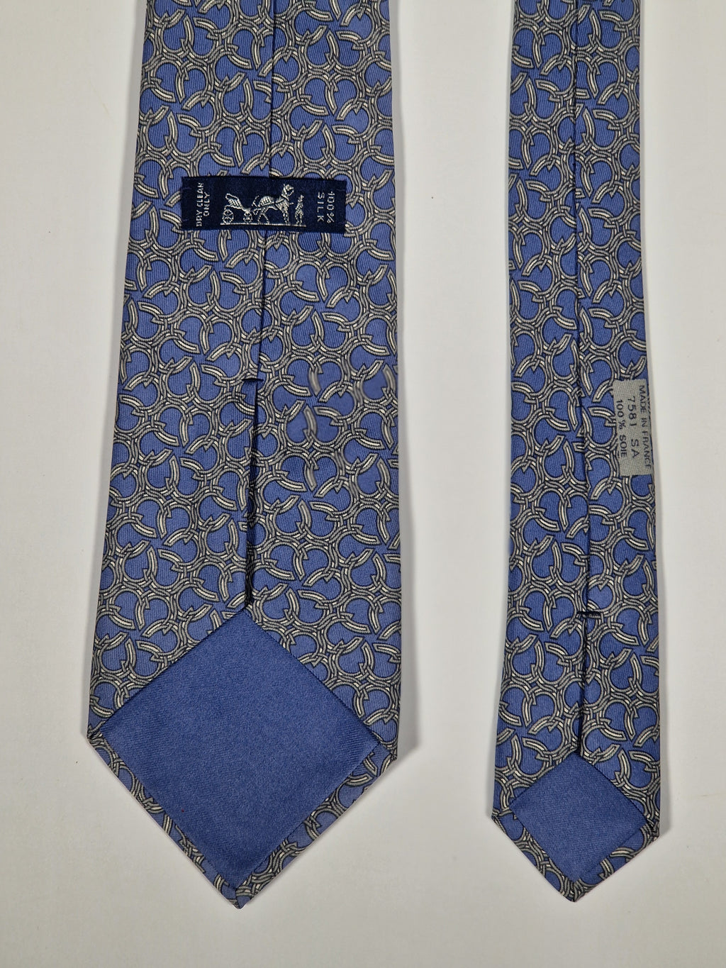 Hermès silk tie blue horse shoe pattern 7581 SA