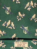 007593 Hermès tie green Bird and instruments 7593 SA