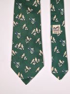 007593 Hermès tie green Bird and instruments 7593 SA