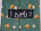 007605 Hermès tie green mouse and cheese 7605 SA