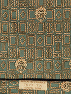 Hermès silk tie green ethnical pattern 7677TA