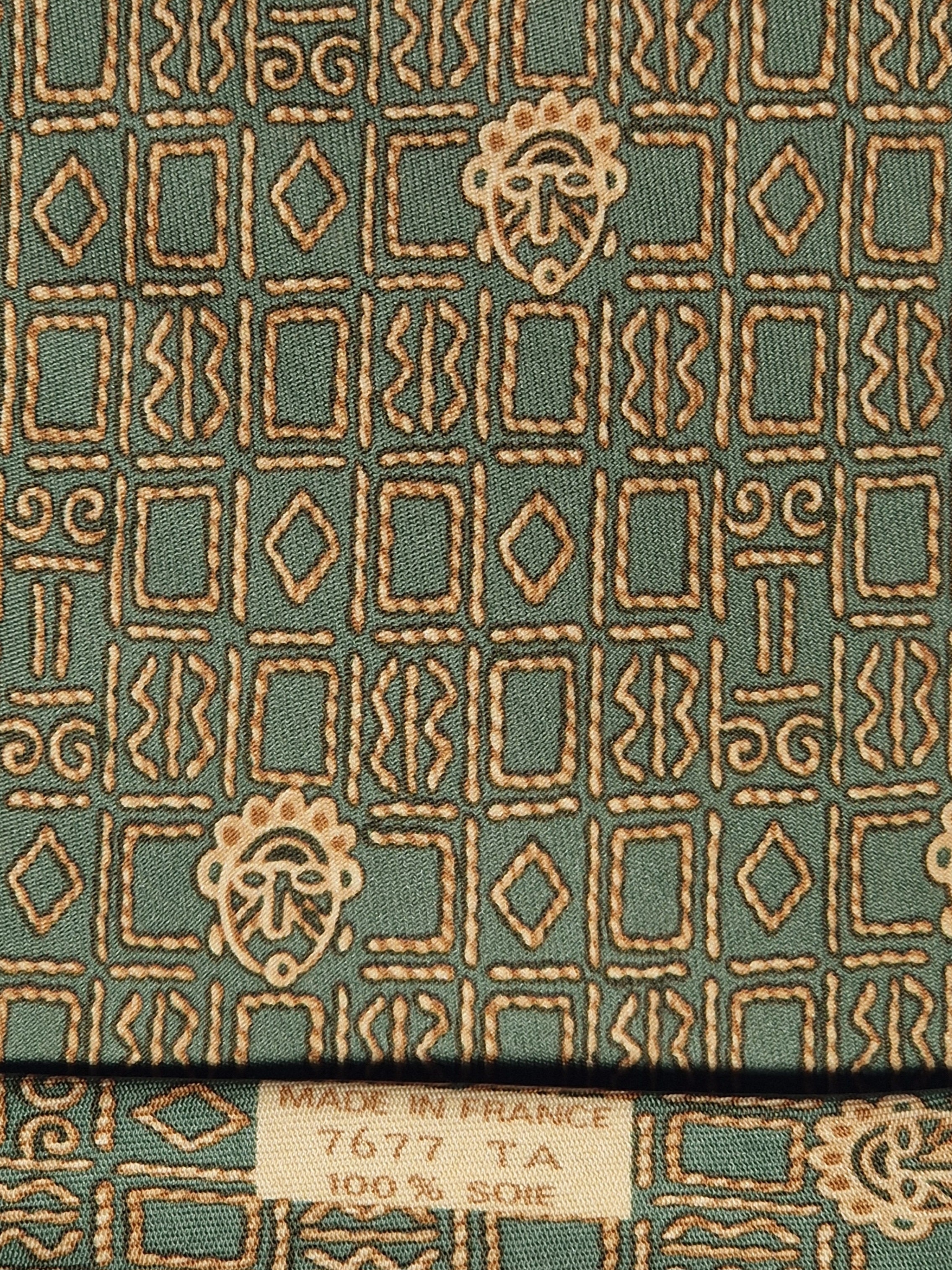 Hermès silk tie green ethnical pattern 7677TA