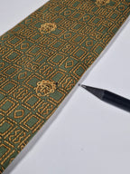 Hermès silk tie green ethnical pattern 7677TA